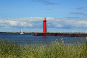 Muskegon, MI view of red lighthouse on the water